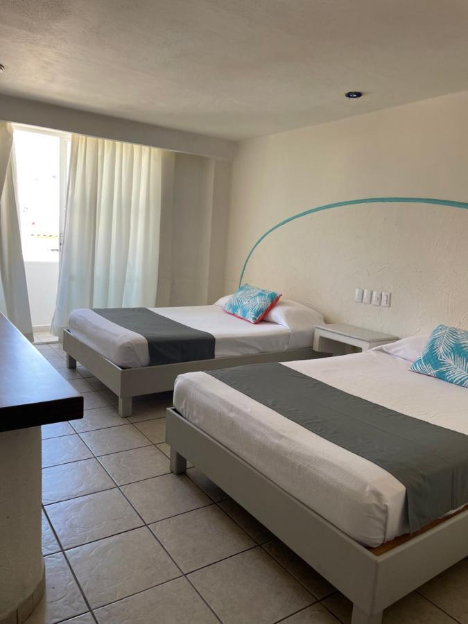 Luna Creciente Santa Cruz Huatulco Exteriör bild